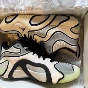 Jordan Tatum 3 Athletic Shoes in Black, White, and Gray.